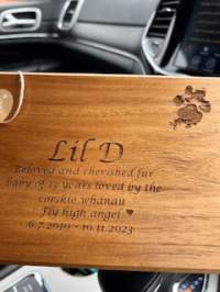 Engraving with actual paw print